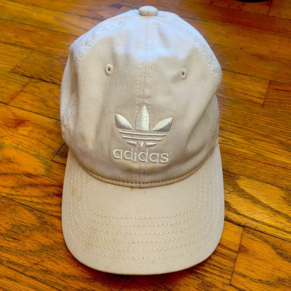 Pink women’s Adidas hat.